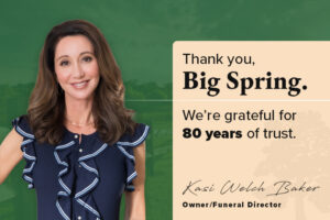 Woman in a navy ruffled blouse stands beside a beige thank-you message reading: 'Thank you, Big Spring. We’re grateful for 80 years of trust.' Signed Kasi Welch Baker, Owner/Funeral Director.