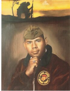 Portrait of a young U.S. Marine in uniform, hand resting on chin, with sunset and silhouette of soldiers in the background.
